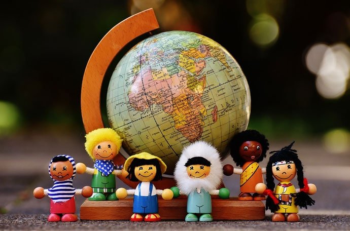 dolls group with world map